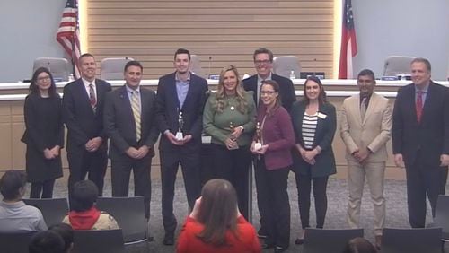 Three members of the Johns Creek Communications Department, Connor McFadden, Edie Damann and Jennifer Chapman were recently recognized by the city for receiving MarCom Awards. COURTESY CITY OF JOHNS CREEK