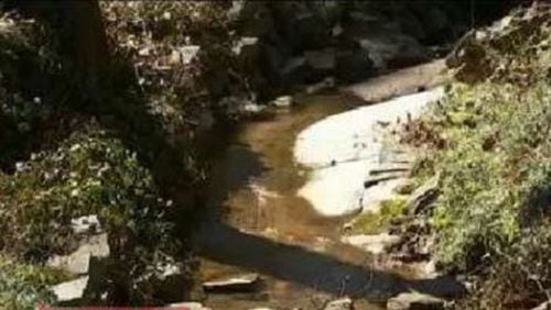 A sewer spill on Aug. 17 at the Nancy Creek Basin in Brookhaven has been contained. WSB file photo