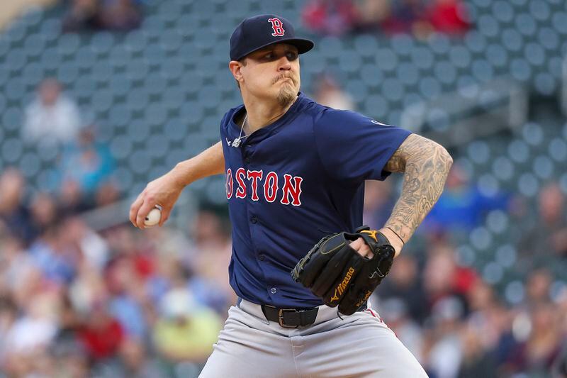 Boston Red Sox starting pitcher Tanner Houck (89) delivers against the Minnesota Twins during the first inning of a baseball game, Friday, May 3, 2024, in Minneapolis. (AP Photo/Matt Krohn)