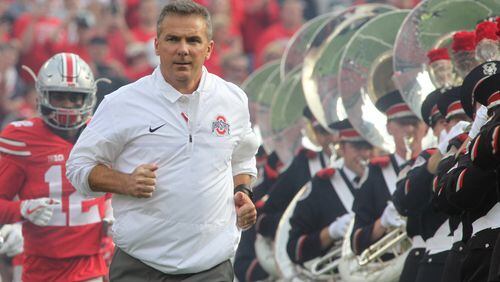 Coach Urban Meyer’s Ohio State Buckeyes will host Michigan in a meeting of top-three teams Saturday.