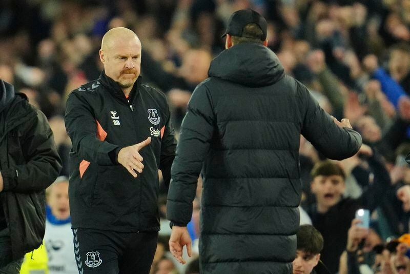 Liverpool's manager Jurgen Klopp, right, congratulates Everton's head coach Sean Dyche after the English Premier League soccer match between Everton and Liverpool at the Goodison Park stadium in Liverpool, Britain, Wednesday, April 24, 2024. Everton won 2-1. (AP Photo/Jon Super)