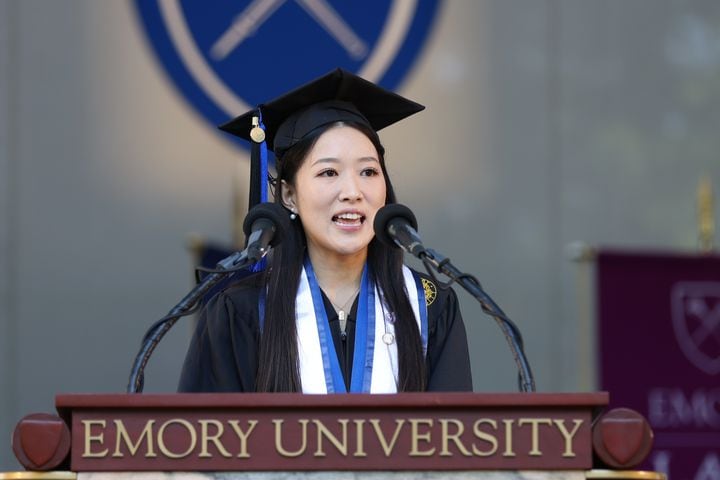 President of the Government Student Association Rachel Ding addresses the crowd with her speech during Emory University’s 2022 Commencement on Monday, May 9, 2022. Miguel Martinez /miguel.martinezjimenez@ajc.com