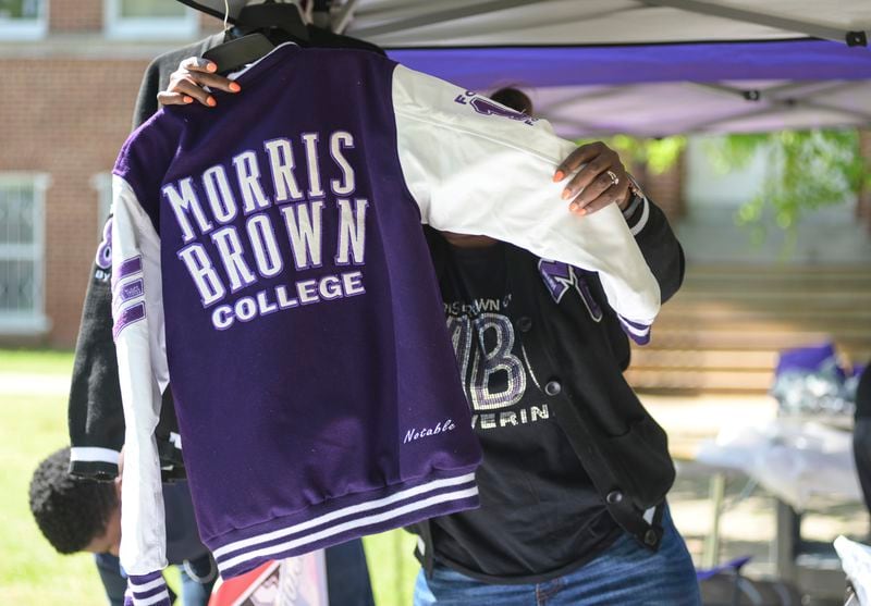 Vendors sell Morris Brown College jackets on the campus in Atlanta on Thursday, April 28, 2022. On Tuesday, the college regained full accreditation after losing it nearly 20 years ago.  (Natrice Miller / natrice.miller@ajc.com)