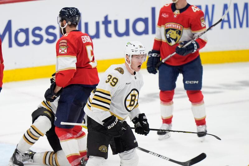Boston Bruins center Morgan Geekie (39) celebrates after scoring during the second period of Game 1 of the second-round series of the Stanley Cup Playoffs against the Florida Panthers, Monday, May 6, 2024, in Sunrise, Fla. (AP Photo/Wilfredo Lee)