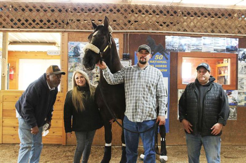 Sarah Burks and Nick Price with the Price Stables crew and Iron Door. (Photo Courtesy of Cat Webb)