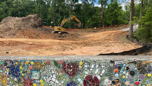 A view of the cleared detention pond on Forest Street in Roswell. City crews cleared  out 50 trees to expand the pond. Credit: Adrianne Murchison