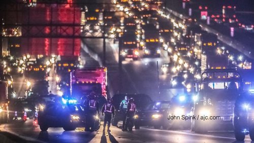 DeKalb County police told AJC.com a pedestrian was hit by at least one vehicle and died at the scene.