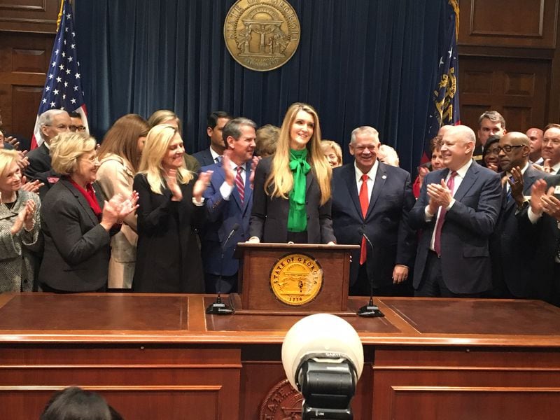 Amid his crowded office, Gov. Brian Kemp announced that business woman Kelly Loeffler will replace U.S. Sen. Johnny Isakson in Washington.