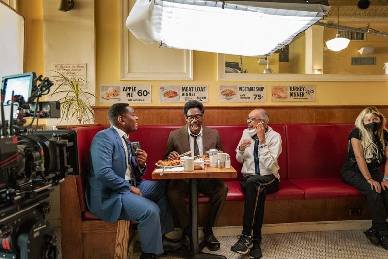 Aml Ameen as Martin Luther King Jr. (from left) and Colman Domingo as Bayard Rustin alongside "Rustin" director and writer George C. Wolfe (Director-Writer). Cr. Parrish Lewis/Netflix © 2023