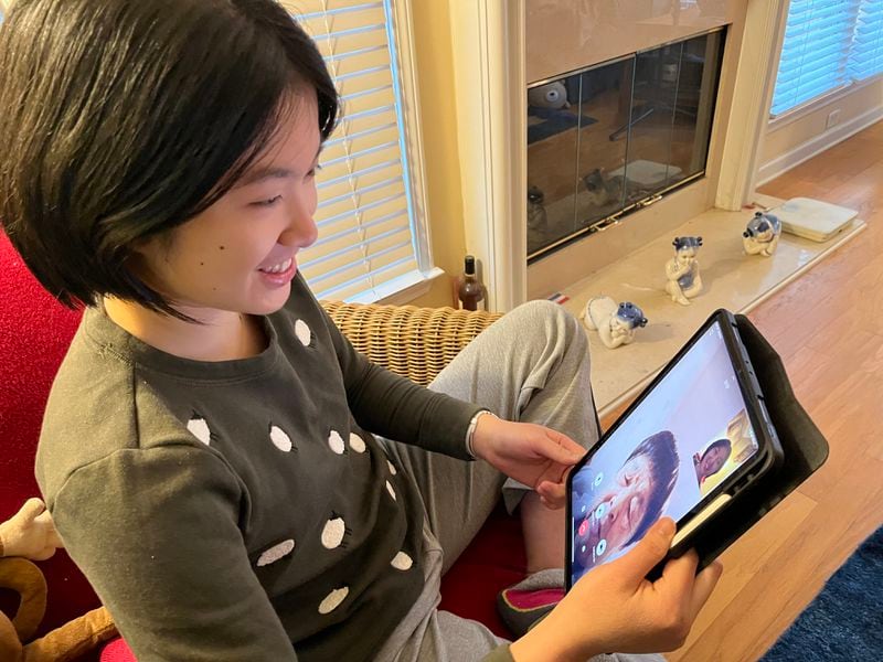Jean speaking with her grandmother Xiue Lin of Fujian, China, during one of their frequent video calls which served as inspiration for her project. Photo courtesy of Jean Yu