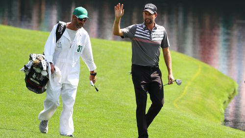Webb Simpson waves to the gallery as he walks to the green on No. 16  during the third round of the Masters Tournament Saturday, April 13, 2019, at Augusta National Golf Club in Augusta. Curtis Compton / ccompton@ajc.com