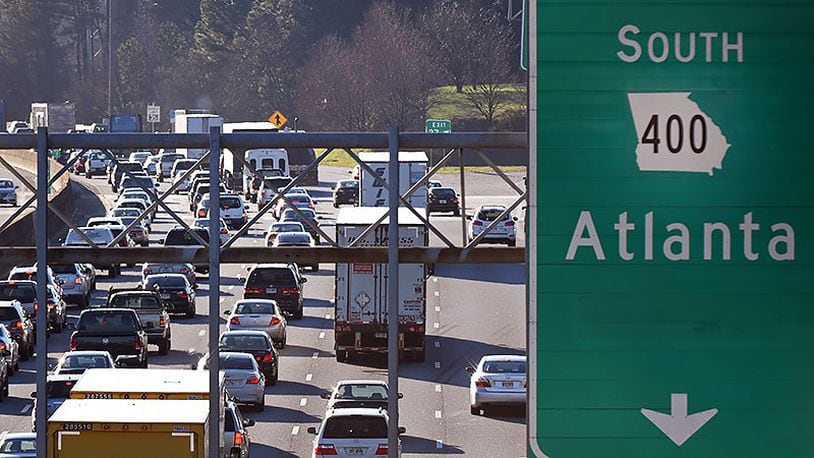 The Georgia Department of Transportation plans to build toll lanes along a 16-mile stretch of Ga. 400 in Fulton and Forsyth counties. (AJC file photo y Hyosub Shin).
