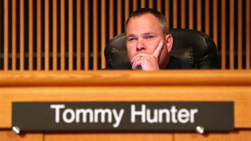 Gwinnett County Commissioner Tommy Hunter at a recent Board of Commissioners meeting. HENRY TAYLOR / HENRY.TAYLOR@AJC.COM