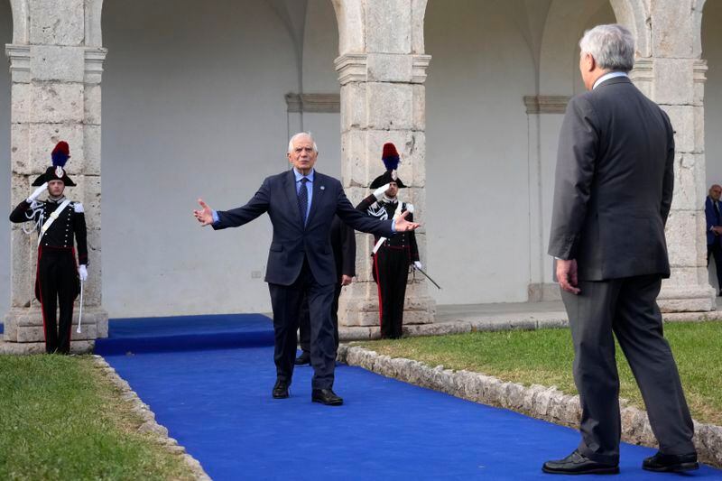 Italian Foreign Minister Antonio Tajani, right, welcomes European Union foreign policy chief Josep Borrell at the G7 Foreign Ministers meeting, on the Island of Capri, Italy, Wednesday, April 17, 2024. Group of Seven foreign ministers are meeting on the Italian resort island of Capri, with soaring tensions in the Mideast and Russia's continuing war in Ukraine topping the agenda. The meeting runs April 17-19. (AP Photo/Gregorio Borgia)