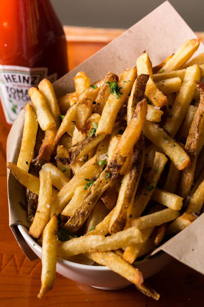 The fresh-cut french fries at Muss & Turner’s East Cobb are a standout. CONTRIBUTED BY MICHAEL MUSSMAN PHOTOGRAPHY
