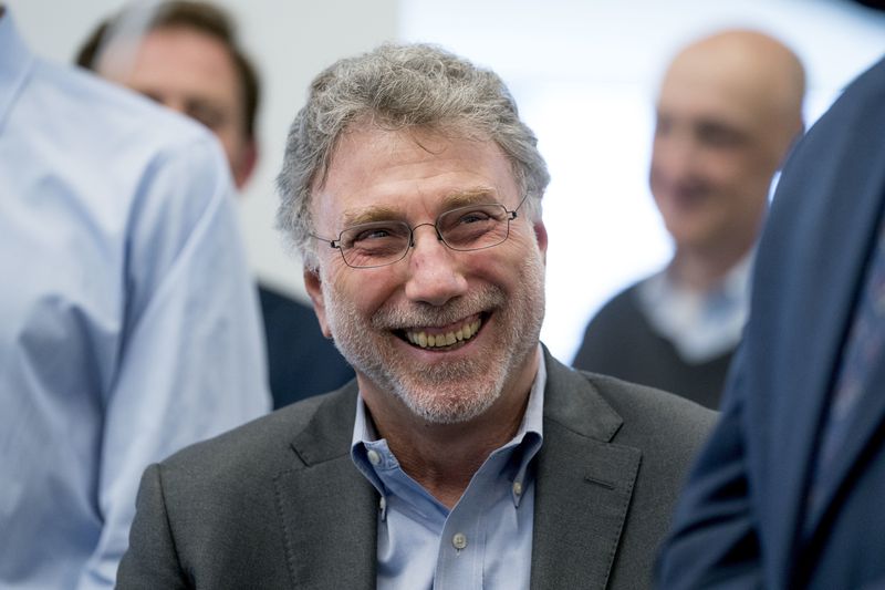 FILE - Washington Post Executive Editor Marty Baron appears in the news room after winning two Pulitzer Prizes in Washington on April 16, 2018. The former editor's battles with young staff members over how they express their opinions over social media left him despondent, a factor in his eventual retirement. “Never have I felt more distant from my fellow journalists,” he wrote about a staff meeting on the topic in his 2023 book, “Collision of Power.” (AP Photo/Andrew Harnik, File)