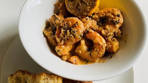 Serpas True Food Big Easy BBQ Shrimp with rosemary focaccia bread. 
Bob Townsend for The Atlanta Journal-Constitution