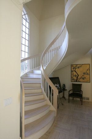 A stylish staircase adds flair to home