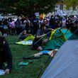 Pro-Palestinian protestors on April 25 at Emory University in Atlanta. Police were called earlier in the day to clear the protest. (Arvin Temkar/The Atlanta Journal-Constitution)