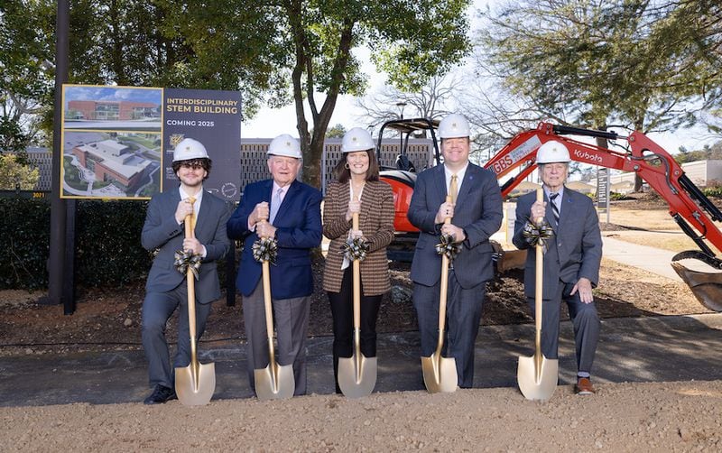 Participants in a Kennesaw State University groundbreaking ceremony for a new STEM facility include (from left) KSU student Nick Farinucci, University System of Georgia Chancellor Sonny Perdue, KSU President Kathy Schwaig and Georgia Board of Regents members Cade Joiner and Jose Perez. (Courtesy of Matthew Yung / Kennesaw State University)