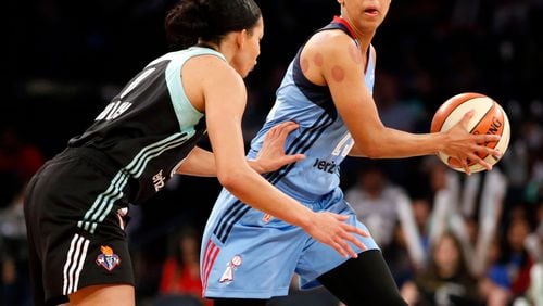 Atlanta Dream guard Layshia Clarendon looks to pass during a game against the New York Liberty.