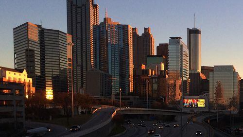 The Downtown skyline glows with the last rays of the setting sun. Ben Gray / @photobgray
