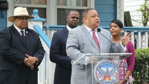 Michael Julian Bond, shown speaking at an April 2017 press conference about the English Avenue and VIne City area,  was certified Saturday as the winner of his at-large Atlanta City Council seat after a recount on Friday, Nov. 17, 2017.