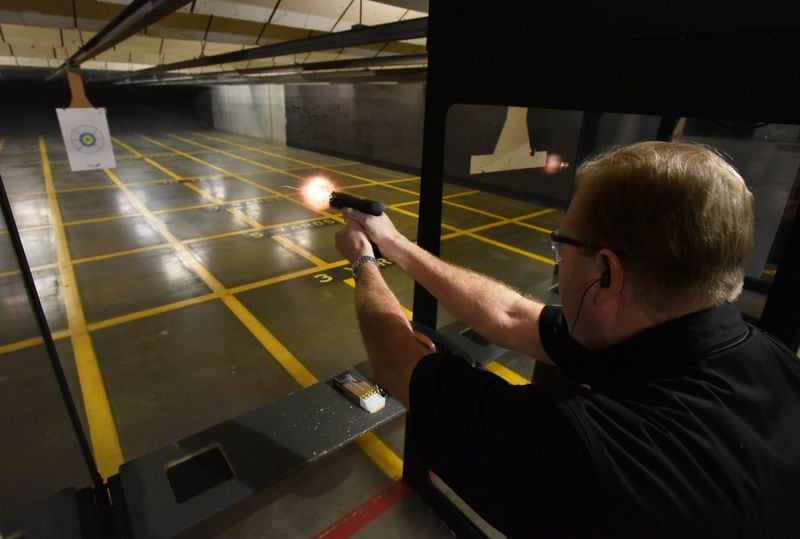 April 7, 2018 Roswell - SharpShooters USA president Tom Deets takes to the gun range at SharpShooters USA in Roswell on Saturday, April 7, 2018. HYOSUB SHIN / HSHIN@AJC.COM