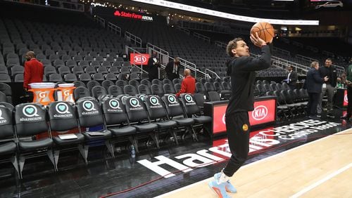 This guy should be good anywhere , from any range - here Trae Young works on his 3-pointer in an empty arena in early March. (Curtis Compton ccompton@ajc.com)