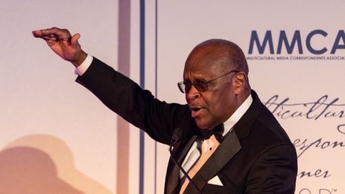 Herman Cain, former host on WSB Radio, speaking at the National Press Club in Washington, D.C. last May. (Photo by Cheriss May/Sipa USA/TNS)