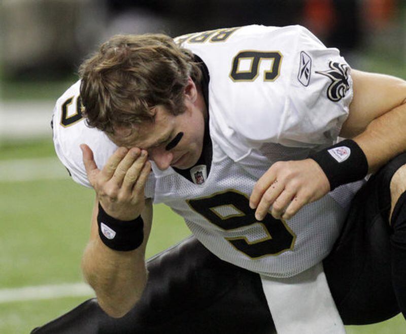 Nov. 13, 2011 - Atlanta: Drew Brees appears to gather his thoughts as he prepares to play the Falcons at the Georgia Dome in Atlanta on Sunday, Nov. 13, 2011. Curtis Compton ccompton@ajc.com Nov. 13, 2011 - Atlanta: Drew Brees appears to gather his thoughts as he prepares to play the Falcons at the Georgia Dome in Atlanta on Sunday, Nov. 13, 2011. Curtis Compton ccompton@ajc.com