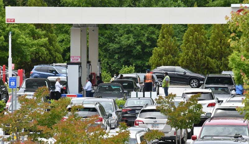 Customers wait their turn to fill up at Costco Brookhaven Warehouse on Tuesday, May 11, 2021. Despite reports of gasoline shortages scattered throughout the Southeast on Tuesday morning because of a cybertattack involving Colonial Pipeline, industry analysts and experts are warning against panic buying and hoarding of gasoline.(Hyosub Shin / Hyosub.Shin@ajc.com)
