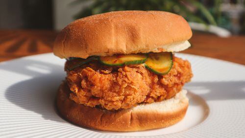 The KFC (Korean Fried Chicken) sandwich at TKO is served with house-made pickles. Courtesy of Colette Collins/TKO