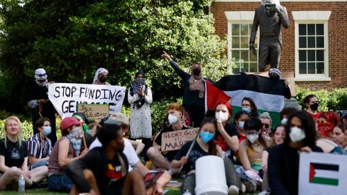 Dozens of Pro-Palestinian protesters decided to stay at the Old Campus lawn late in the afternoon with no police presence at University Arch at UGA campus in Athens on Monday, April 29, 2024.
(Miguel Martinez / AJC)
