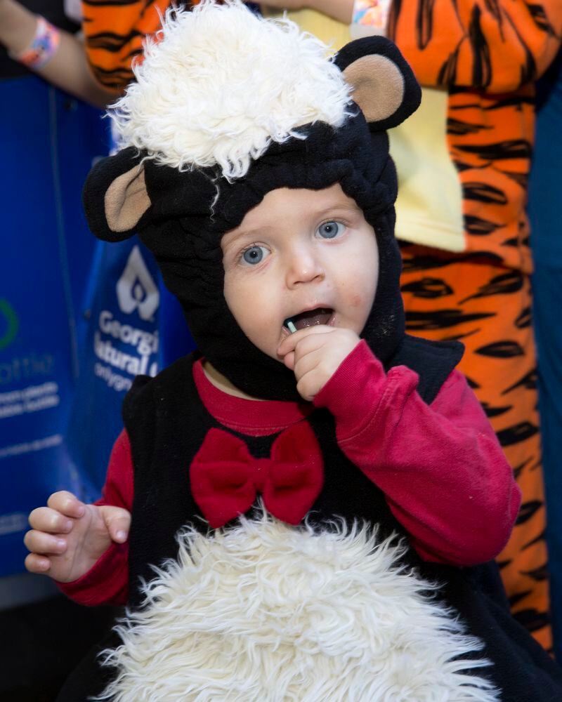 Kid in costume enjoys festivities at Boo at the Zoo. Courtesy of Zoo Atlanta
