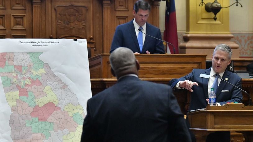 State Sen. John Kennedy, R-Macon, answers a question from state Sen. Emanuel Jones, D-Decatur, foreground, during a special session on redistricting in November 2021. A federal trial on the legality of Georgia's redistricting begins Tuesday. (Hyosub Shin / Hyosub.Shin@ajc.com)