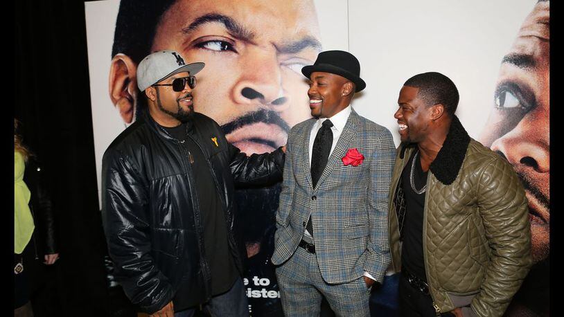 Ice Cube, left, shown with Will Packer and Kevin Hart at the Atlanta premiere of "Ride Along." AJC file photo