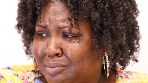 Suicide survivor Doris Adhuze, a mom whose 13-year-old son Jovany hanged himself last year, fights back tears during an interview discussing her loss on Thursday, Sept 13, 2018, in Decatur. Curtis Compton/ccompton@ajc.com