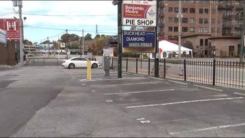 This parking lot in Buckhead is where a reported shooting happened between a booting company employee and the driver of a booted car.  No arrests have been made in the incident. (Photo: Channel 2 Action News)