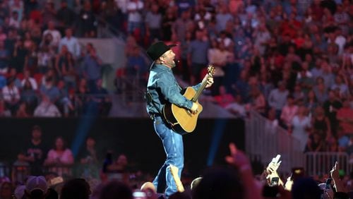 Garth Brooks played to more than 80,000 fans at the first show at Mercedes-Benz Stadium. Photographers shooting the concert, including the AJC's Robb Cohen, were only allowed to shoot the second half of the first song and the first half of the second song. Photo: Robb Cohen Photography & Video /RobbsPhotos.com