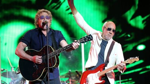 Roger Daltrey, left, and Pete Townshend of the rock band The Who perform at the Glastonbury Festival.