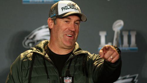 Philadelphia Eagles head coach Doug Pederson smiles a points as he answers questions during a press conference in advance of Super Bowl LII against the New England Patriots at Mall of America.