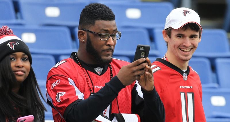 102515 NASHVILLE: -- Falcons fans begins to arrive and snap photos of their team as they prepare to play the Titans in a football game on Sunday, Oct. 25, 2015, in Nashville. Curtis Compton / ccompton@ajc.com