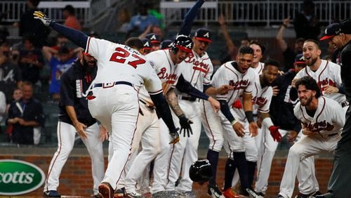 Matt Kemp #27 of the Braves celebrates after hitting a walk-off two-run homer in the 11th inning for a 5-3 win over the San Francisco Giants at SunTrust Park on June 21, 2017 in Atlanta, Georgia. (Photo by Kevin C. Cox/Getty Images)