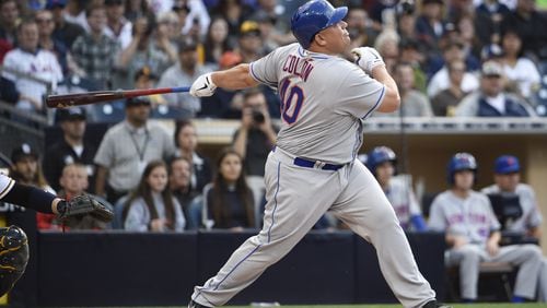 Bartolo Colon belts a home run for the Mets at San Diego on May 7.	(Photo by Denis Poroy/Getty Images)