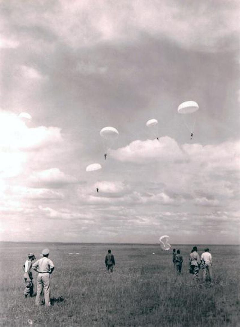 555th Parachute Infantry Battalion conducting some of their first test jumps as smokejumpers, circa 1945. (USDA Forest Service)