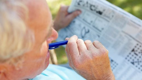 A new study says that keeping the mind active may delay symptoms of Alzheimer’s disease, but the activity does not change the underlying disease in the brain for most people. (Photo courtesy Fotolia/TNS)