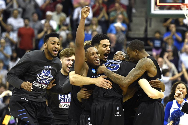 Mar 19, 2015; Jacksonville, FL, USA; The Georgia State Panthers bench surrounds Panthers guard R.J. Hunter (22) after their victory over the Baylor Bears in the second round of the 2015 NCAA Tournament at Jacksonville Veteran Memorial Arena.Georgia State defeated Baylor 57-56 on Hunter's three point basket with 2.8 second left in the game.  Mandatory Credit: John David Mercer-USA TODAY Sports