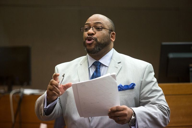 Fulton County Chief Assistant District Attorney Clint Rucker talks to jurors Friday. STEVE SCHAEFER / SPECIAL TO THE AJC