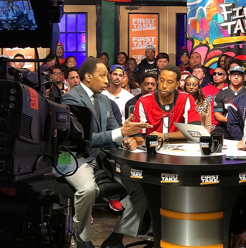  Ludacris talks on the set of ESPN's "First Take" with host Stephen A. Smith. Photo: Ryon Horne/AJC